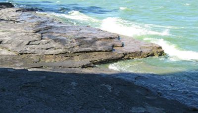 Waves on limestone shore