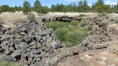 Lava tube collapse area, El Malpais National Monument, New Mexico.