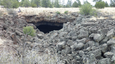 Partly collapsed lava tube, El Malpais National Monument, New Mexico.