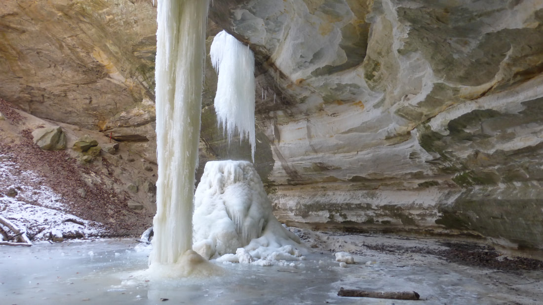 Ice falls beneath canyon head overhang, Starved Rock State Park, Illinois.